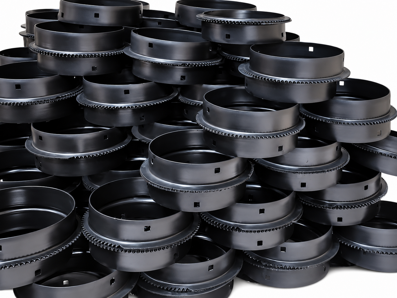 Black toothed metal rings with square cutouts in their sides