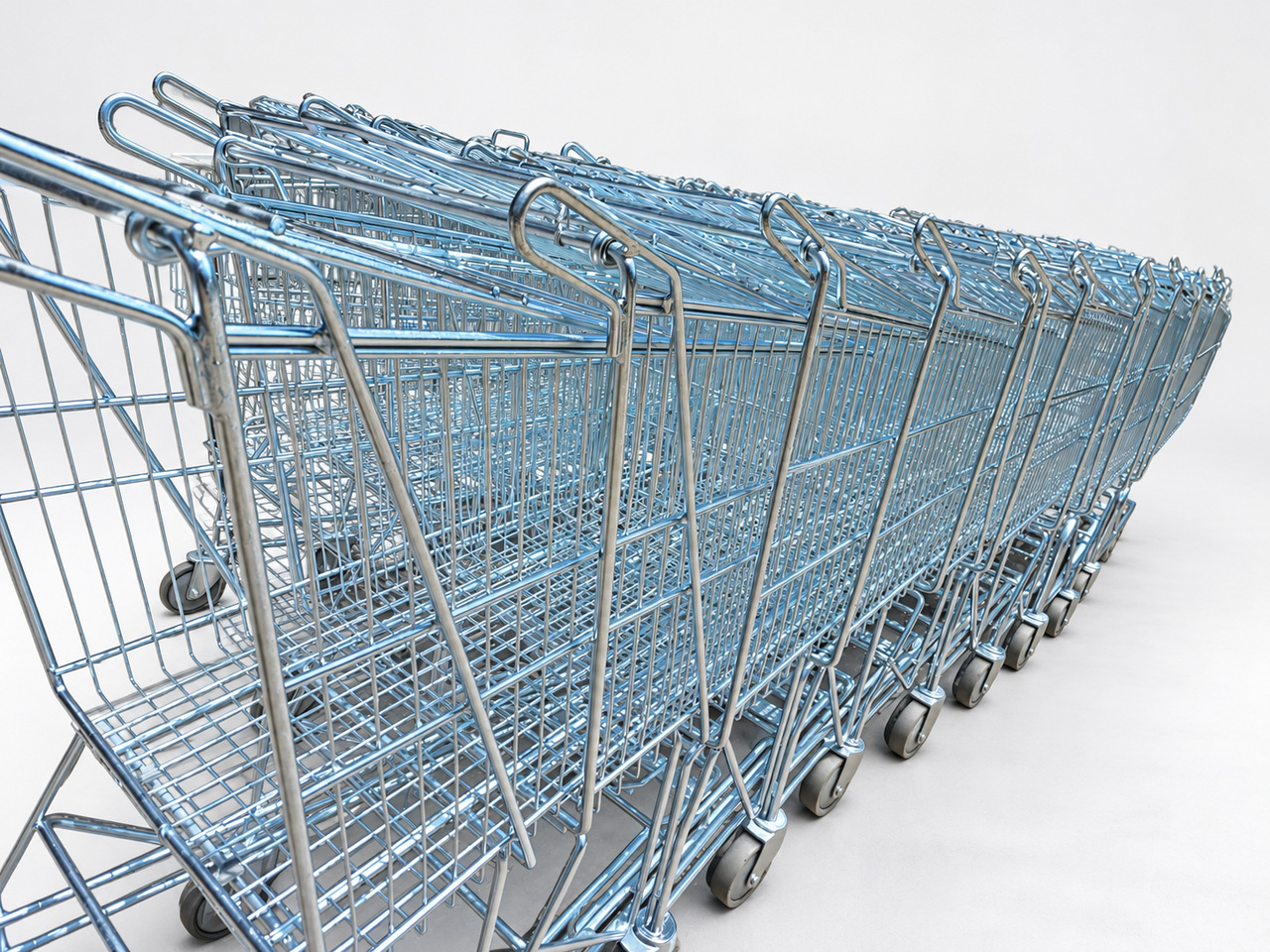 Nested metal trolleys with a blue-passivated silver finish